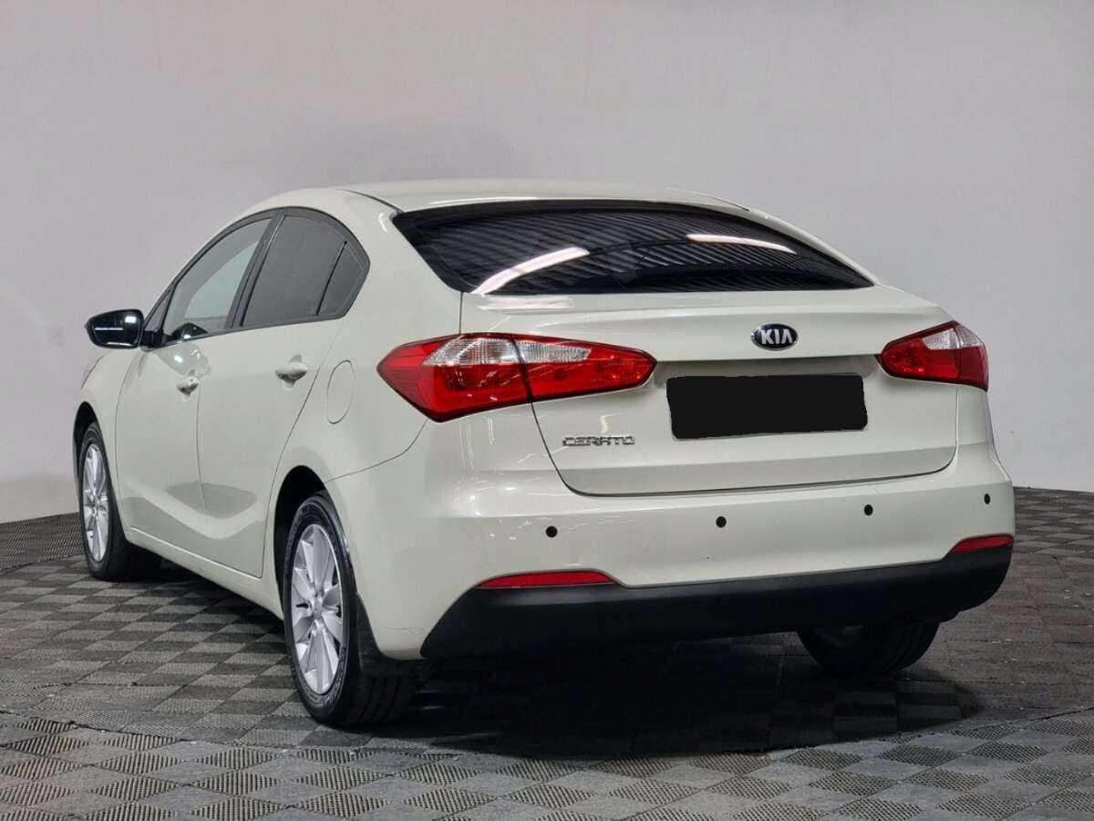 Kia Cerato с пробегом — 2014 год. Фото: #3