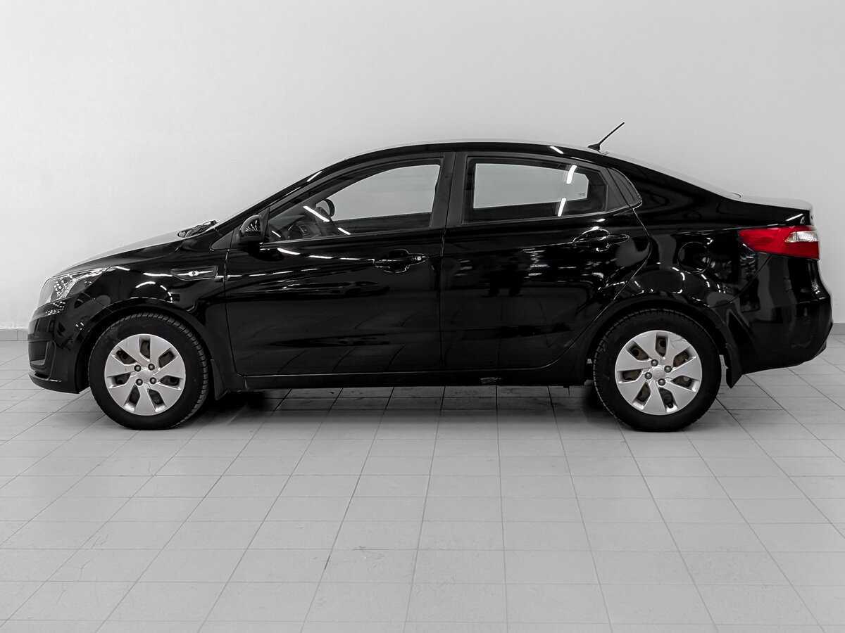 Kia Rio с пробегом — 2013 год. Фото: #7
