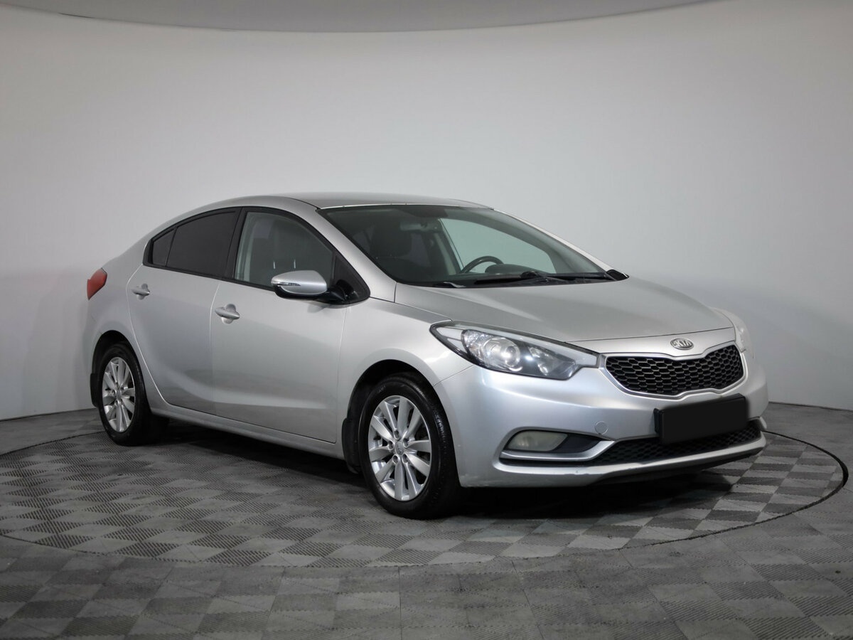 Kia Cerato с пробегом — 2013 год. Фото: #2