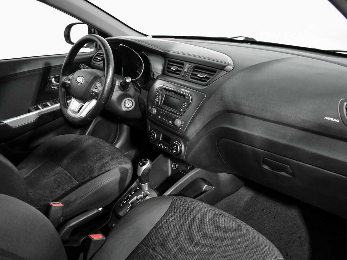 Kia Rio с пробегом — 2013 год. Фото: #12