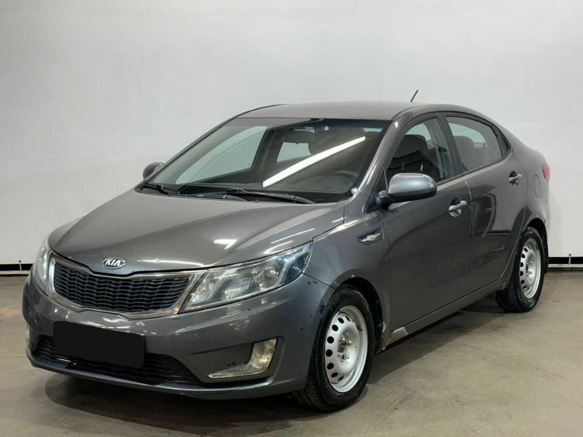 Kia Rio с пробегом — 2013 год. Фото: #0