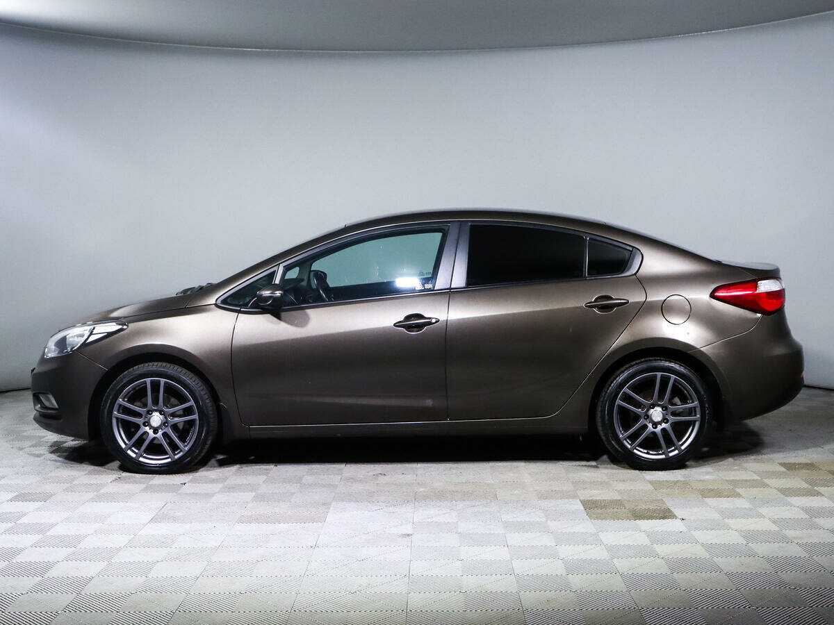 Kia Cerato с пробегом — 2015 год. Фото: #7