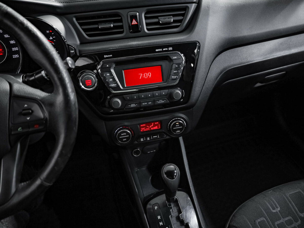 Kia Rio с пробегом — 2013 год. Фото: #12
