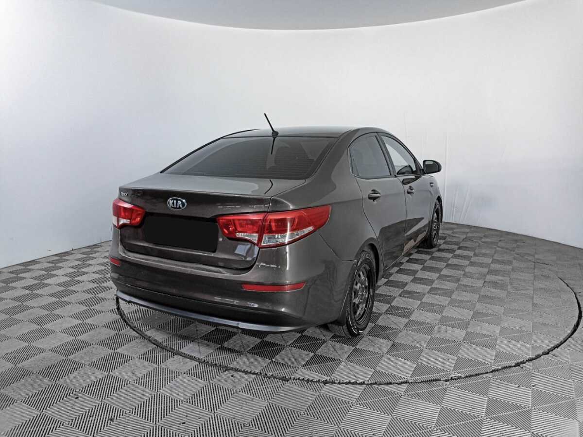 Kia Rio с пробегом — 2015 год. Фото: #4