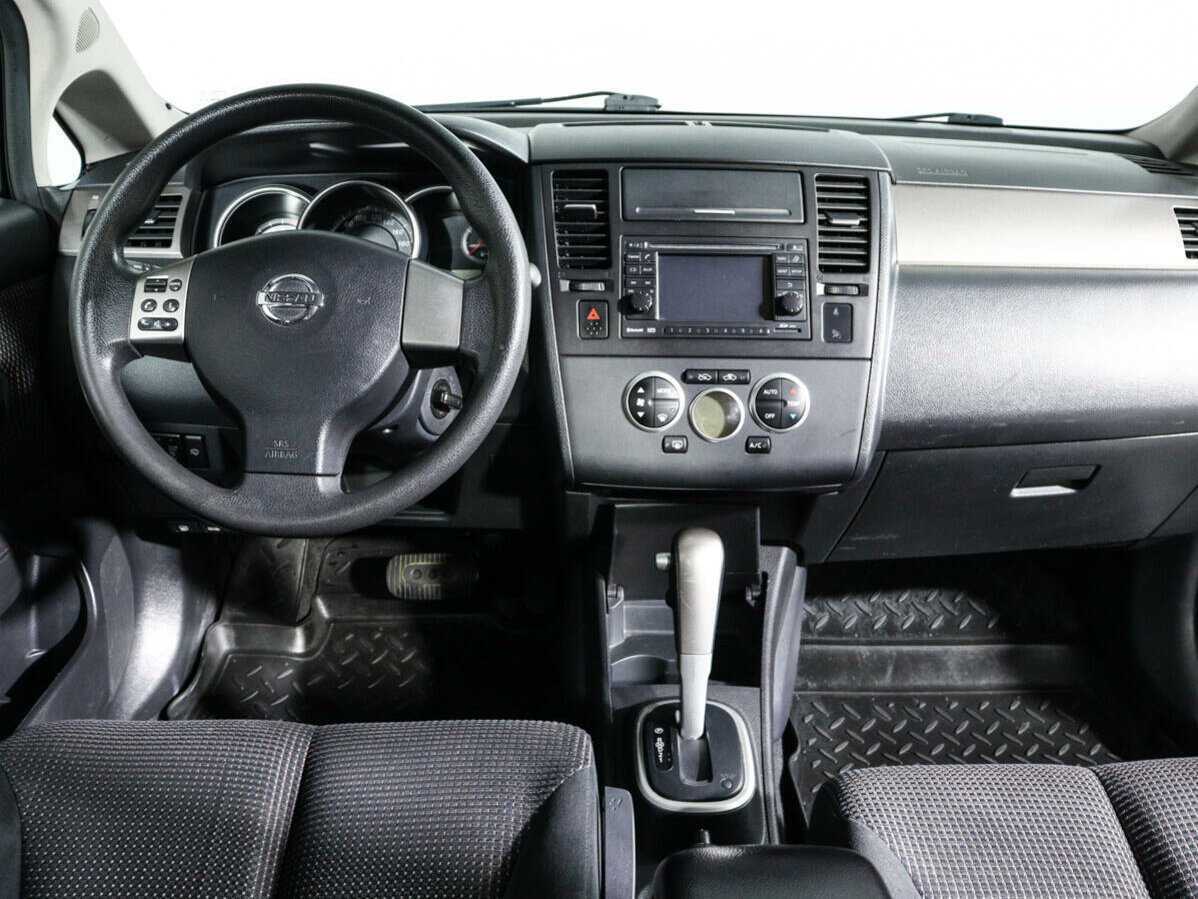Nissan Tiida с пробегом — 2013 год. Фото: #9