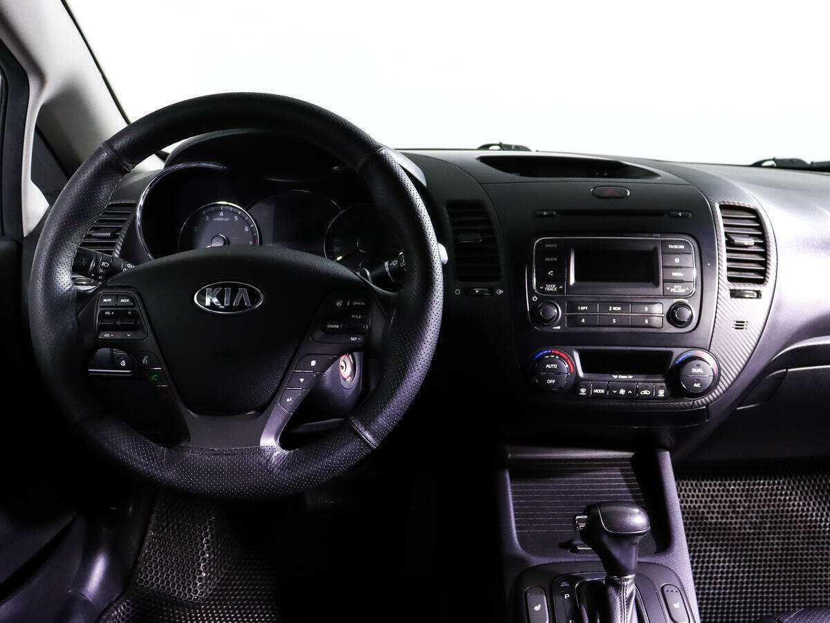 Kia Cerato с пробегом — 2014 год. Фото: #11