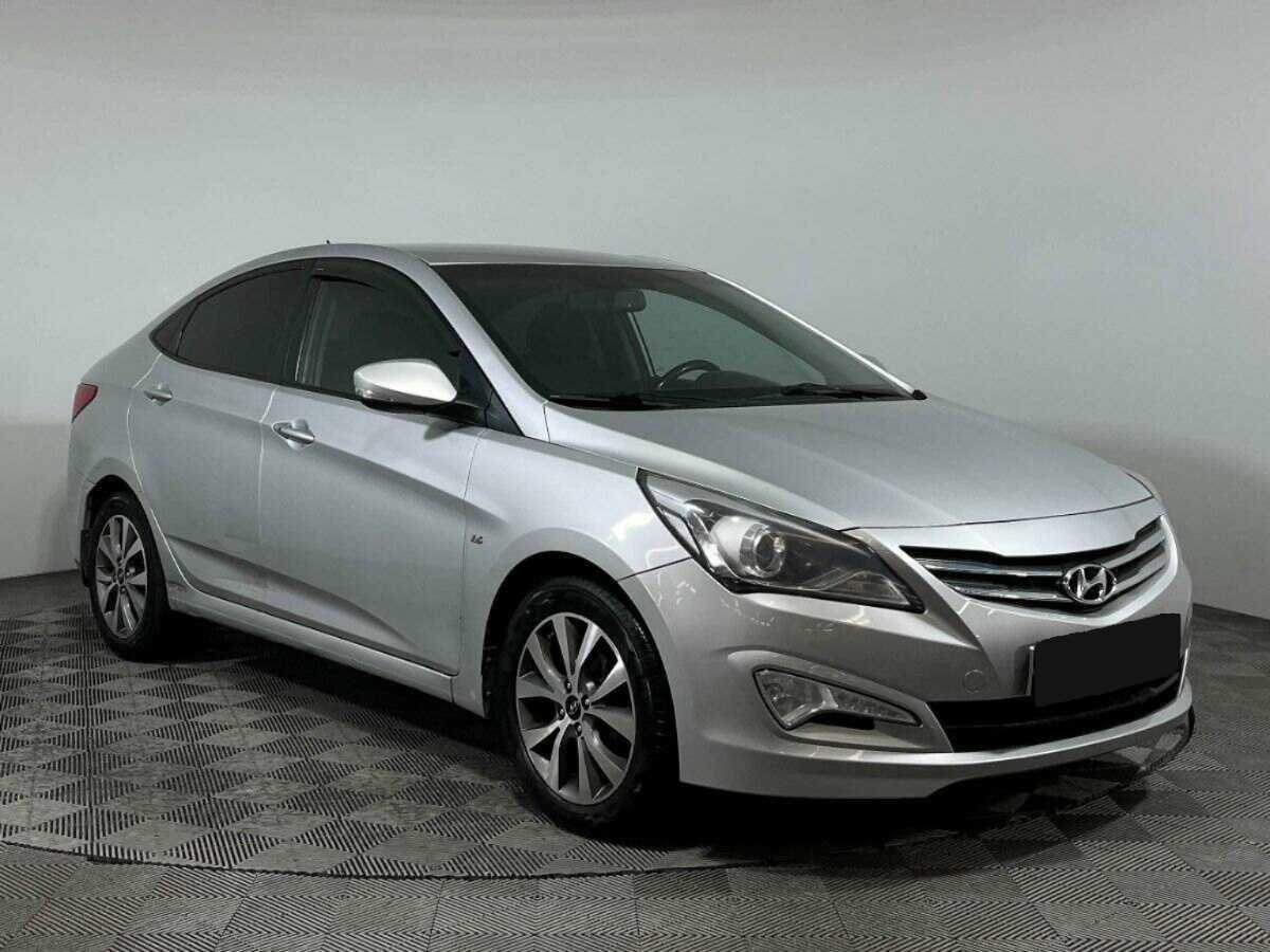 Hyundai Solaris с пробегом — 2014 год. Фото: #2