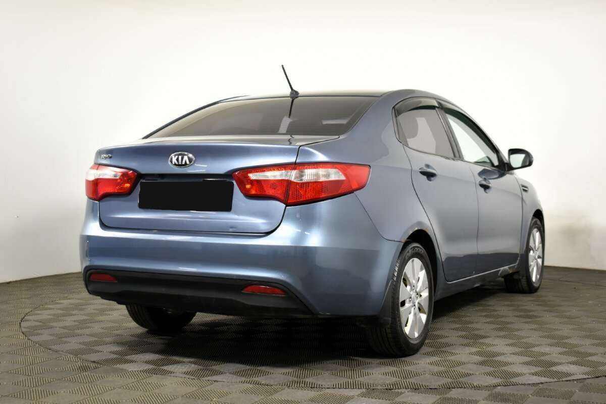 Kia Rio с пробегом — 2013 год. Фото: #3
