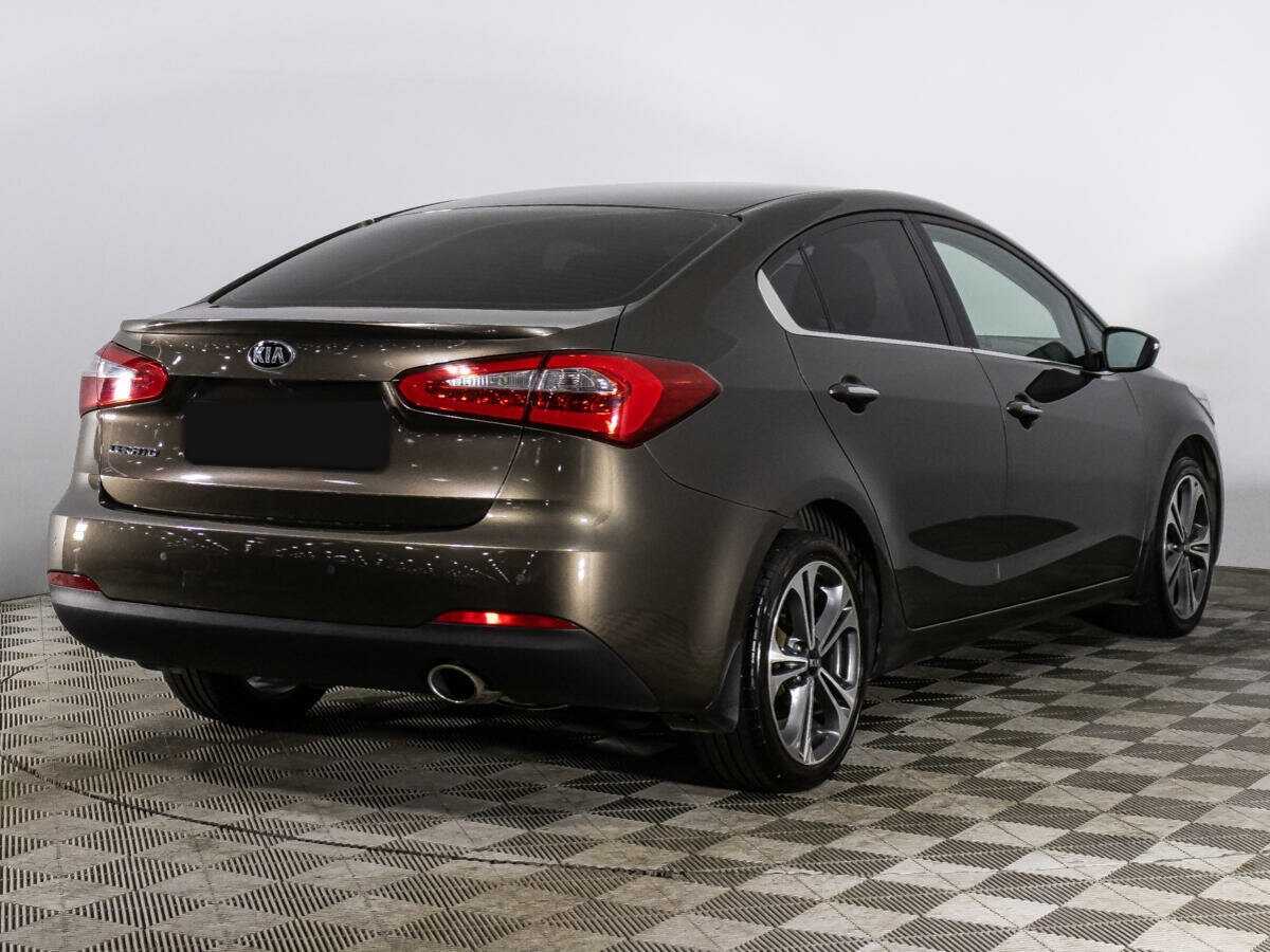 Kia Cerato с пробегом — 2015 год. Фото: #4