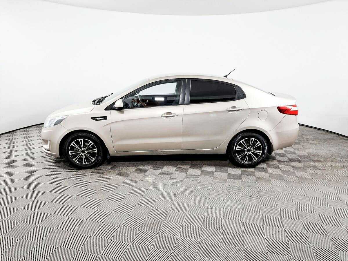 Kia Rio с пробегом — 2013 год. Фото: #7