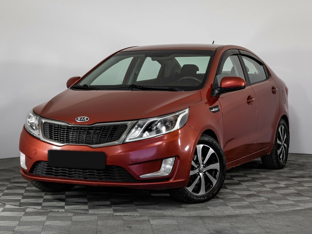 Kia Rio с пробегом — 2012 год. Фото: #0