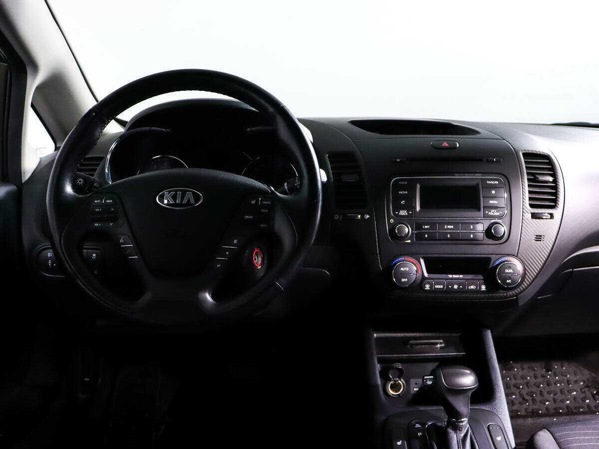 Kia Cerato с пробегом — 2015 год. Фото: #11