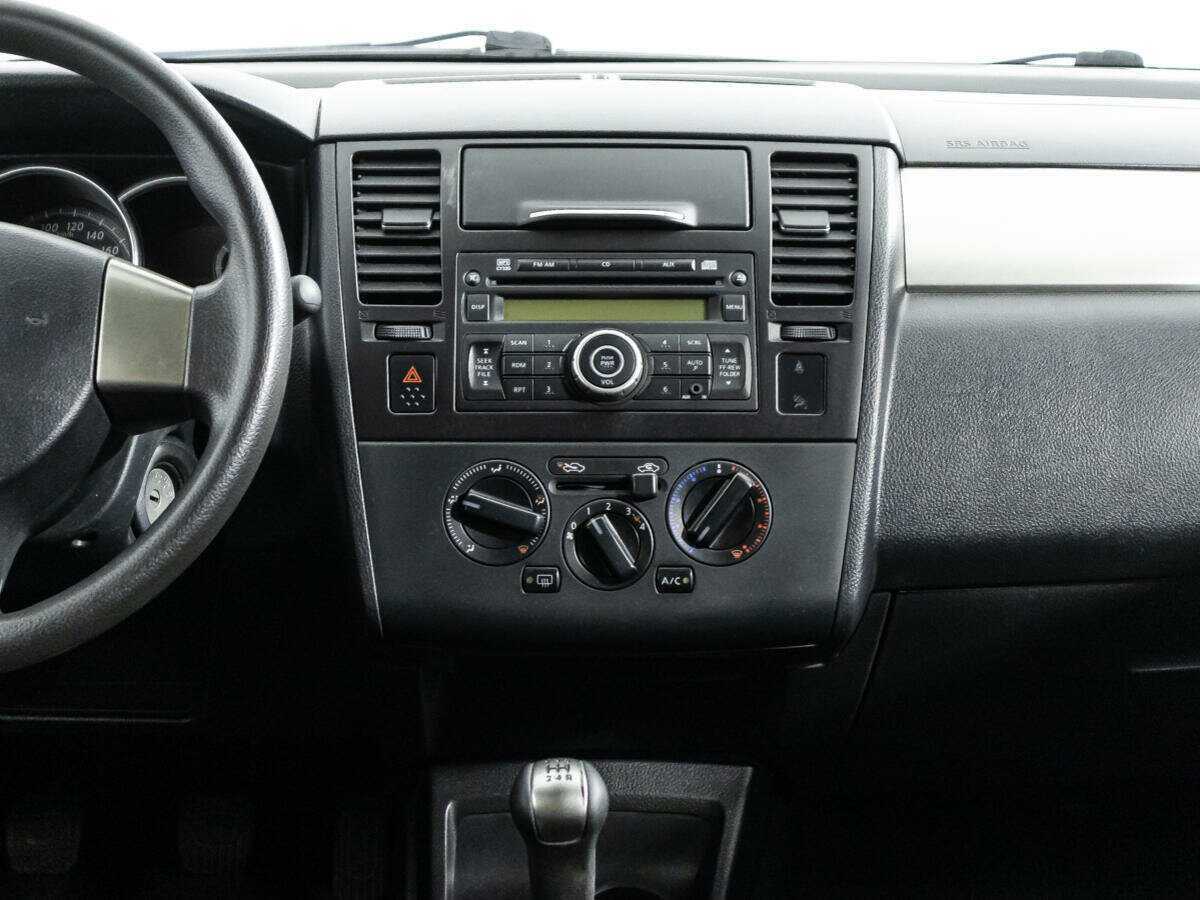 Nissan Tiida с пробегом — 2013 год. Фото: #13