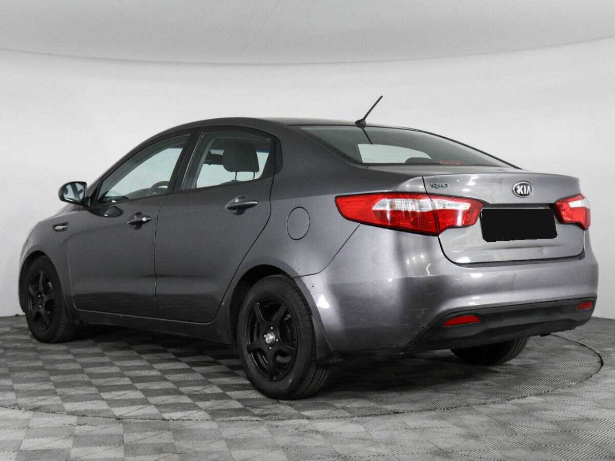 Kia Rio с пробегом — 2013 год. Фото: #6