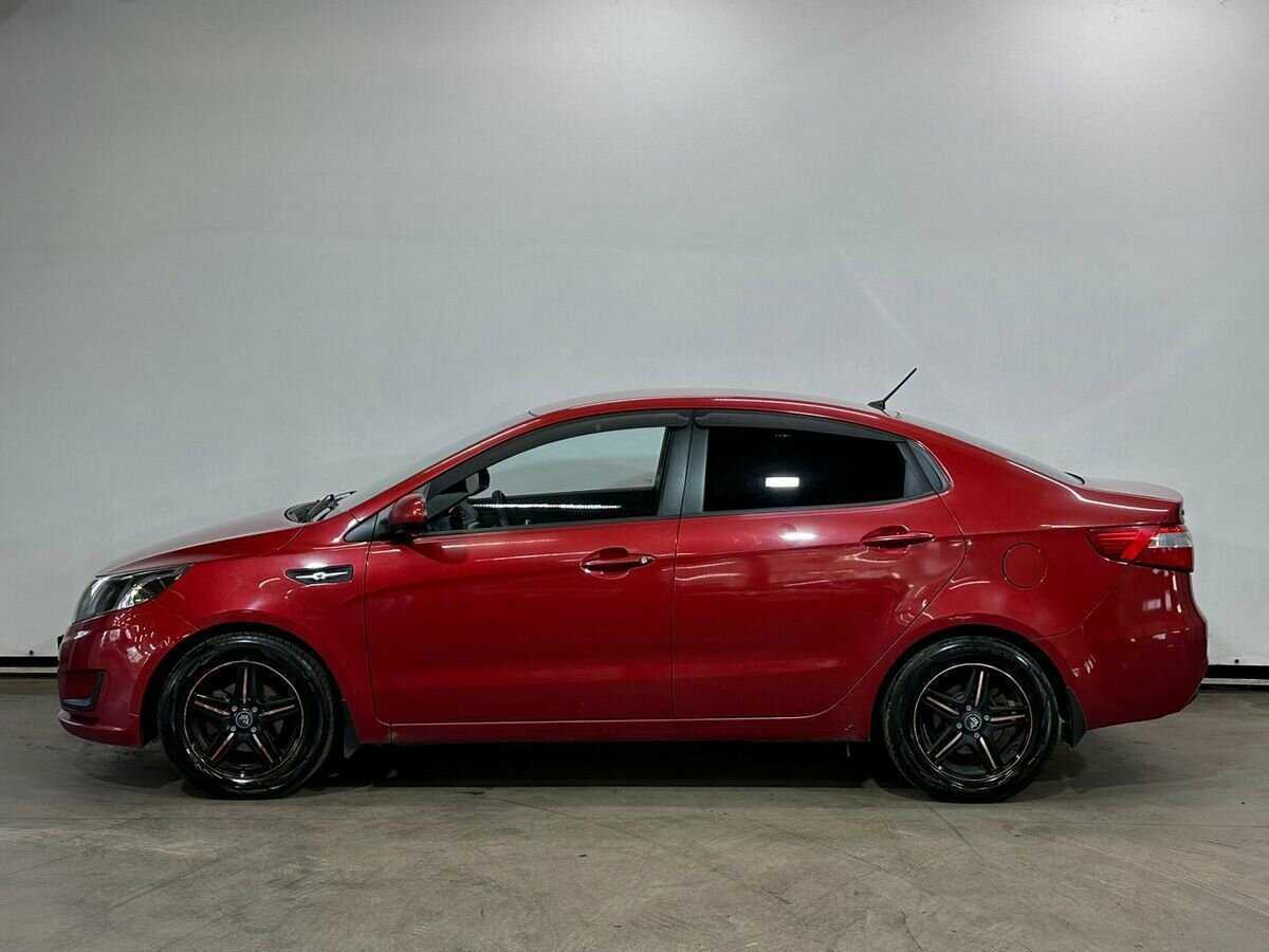 Kia Rio с пробегом — 2013 год. Фото: #7