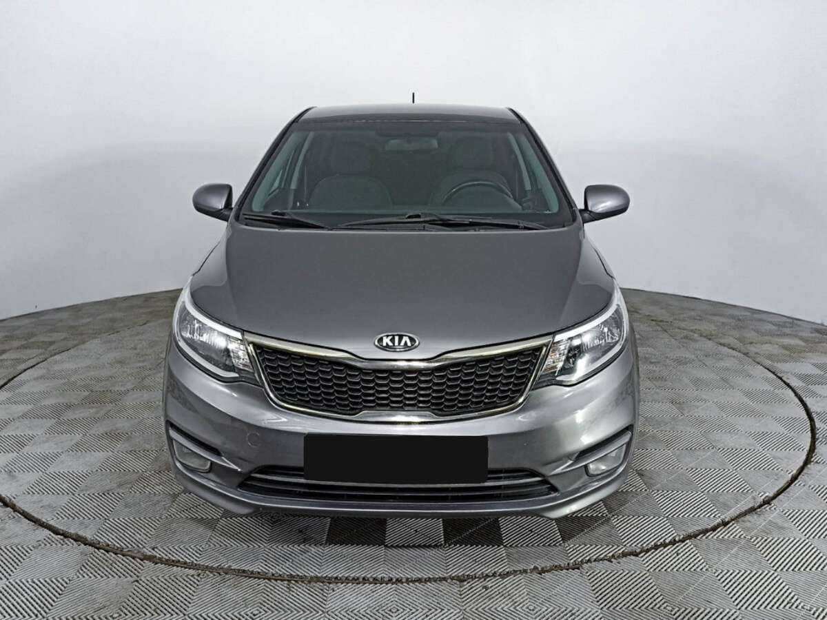 Kia Rio с пробегом — 2015 год. Фото: #1