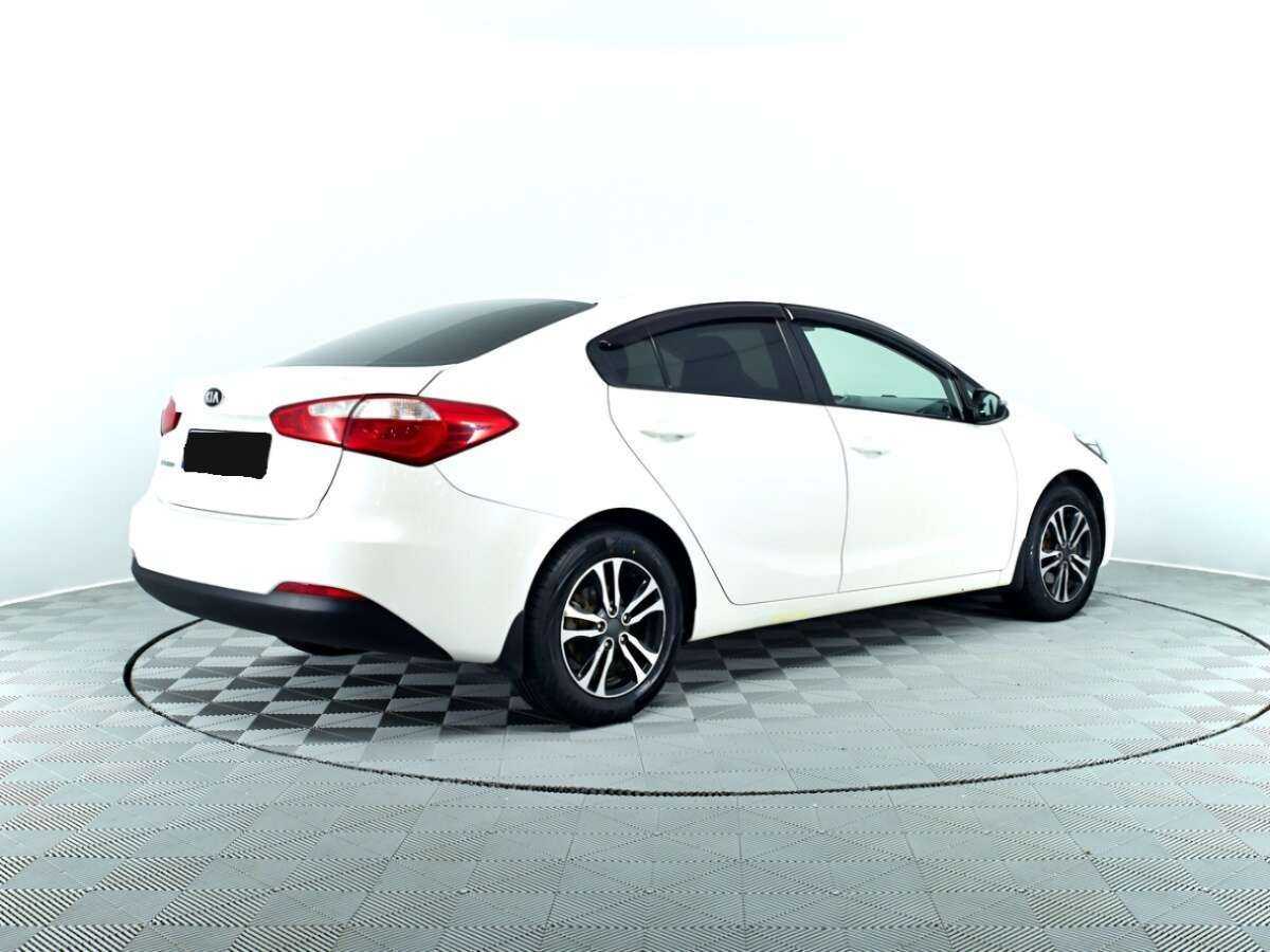 Kia Cerato с пробегом — 2014 год. Фото: #4