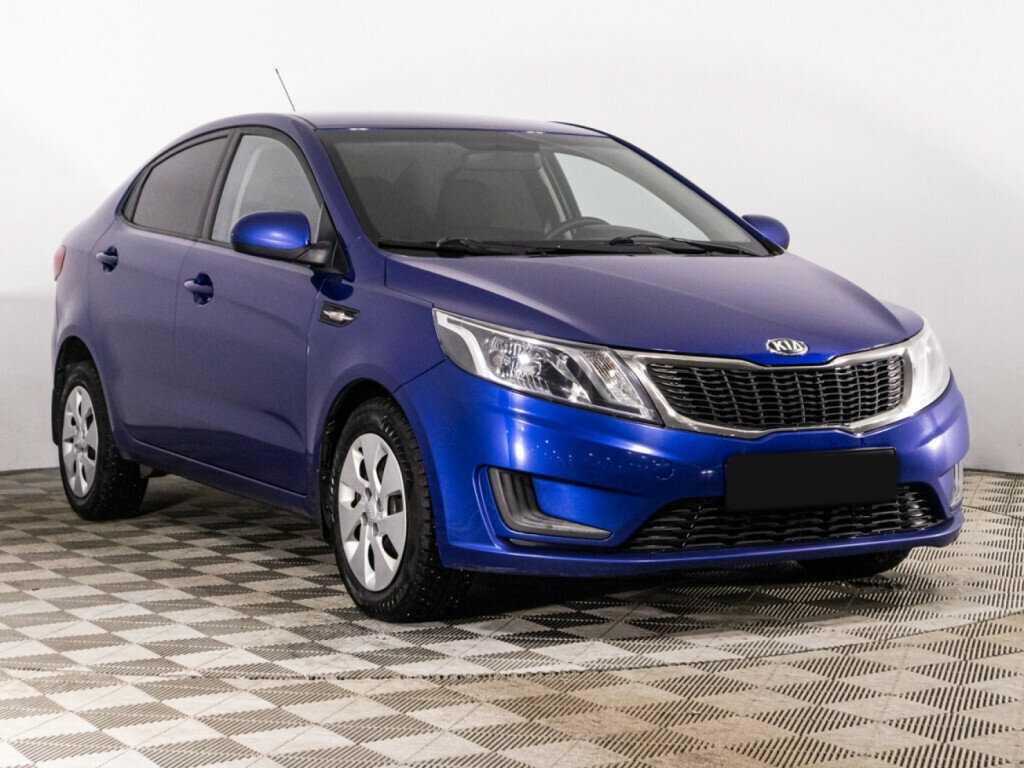 Kia Rio с пробегом — 2013 год. Фото: #2