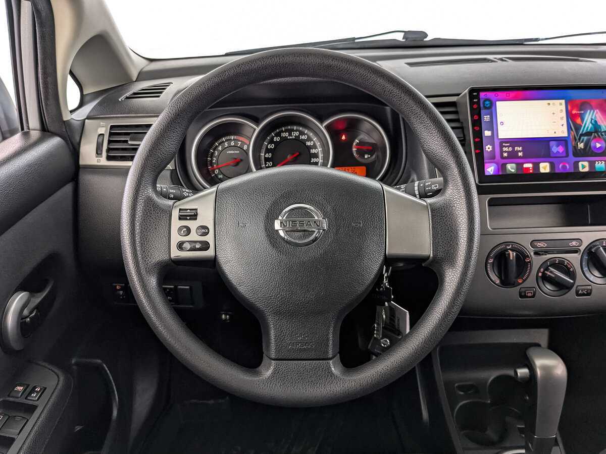 Nissan Tiida с пробегом — 2013 год. Фото: #21