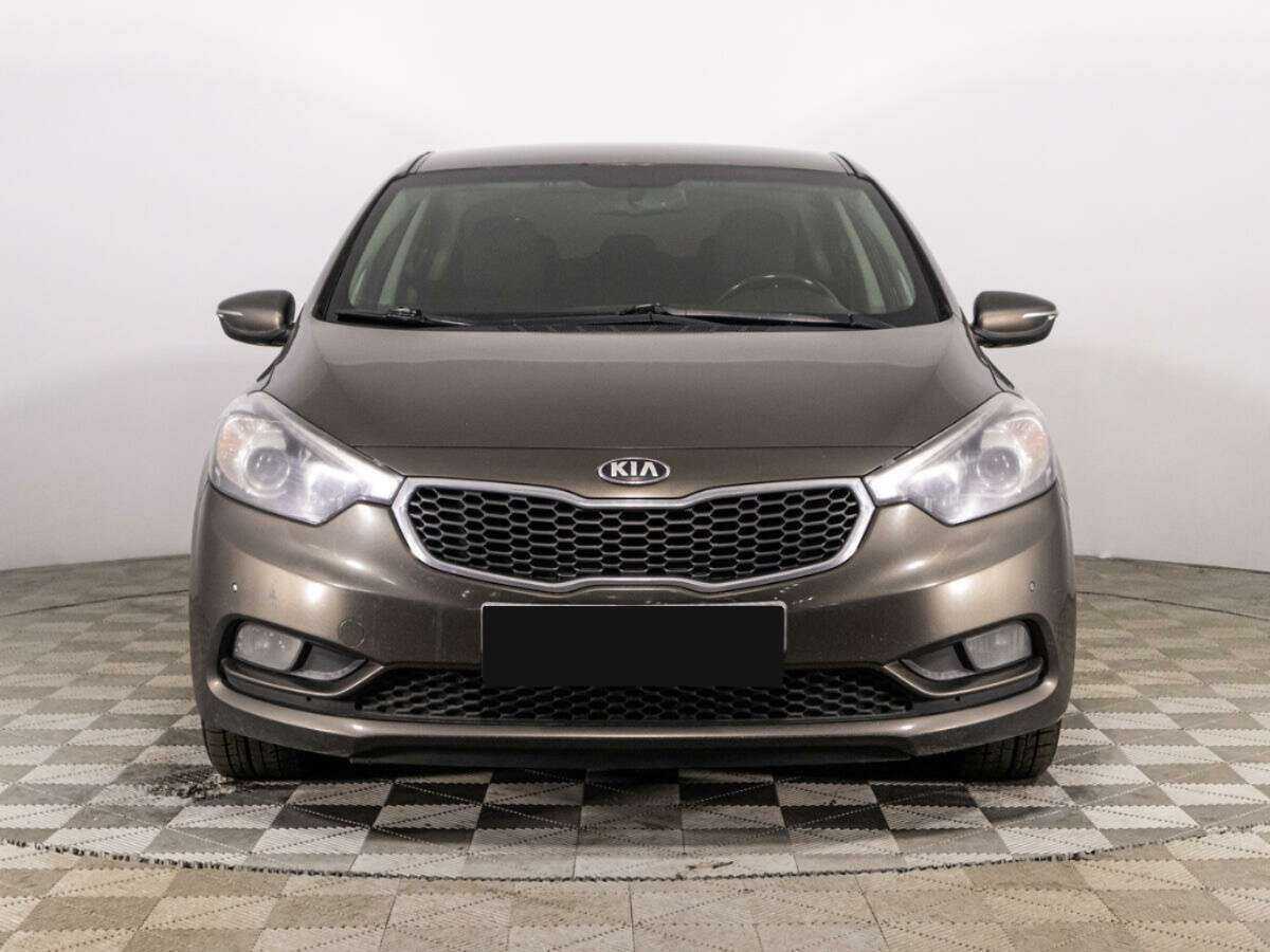 Kia Cerato с пробегом — 2014 год. Фото: #1