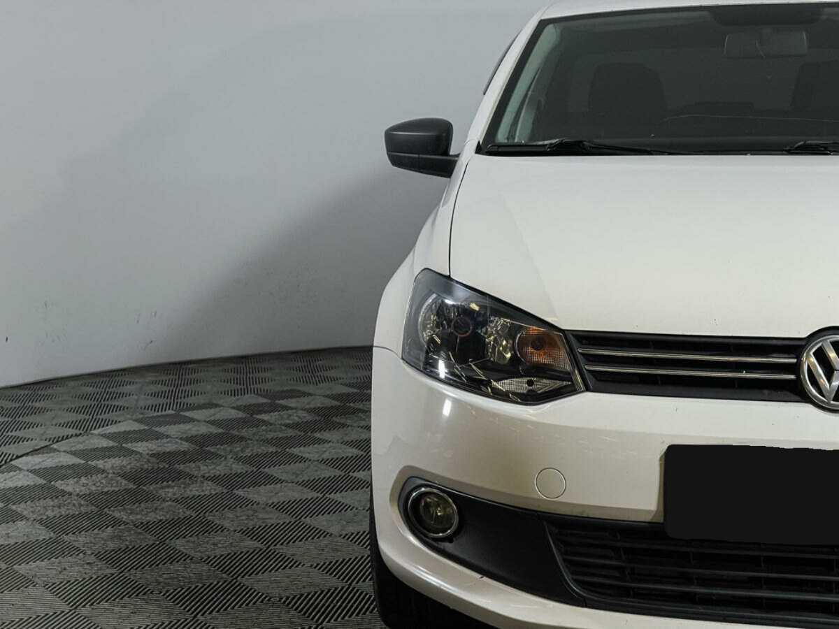 Volkswagen Polo с пробегом — 2012 год. Фото: #13