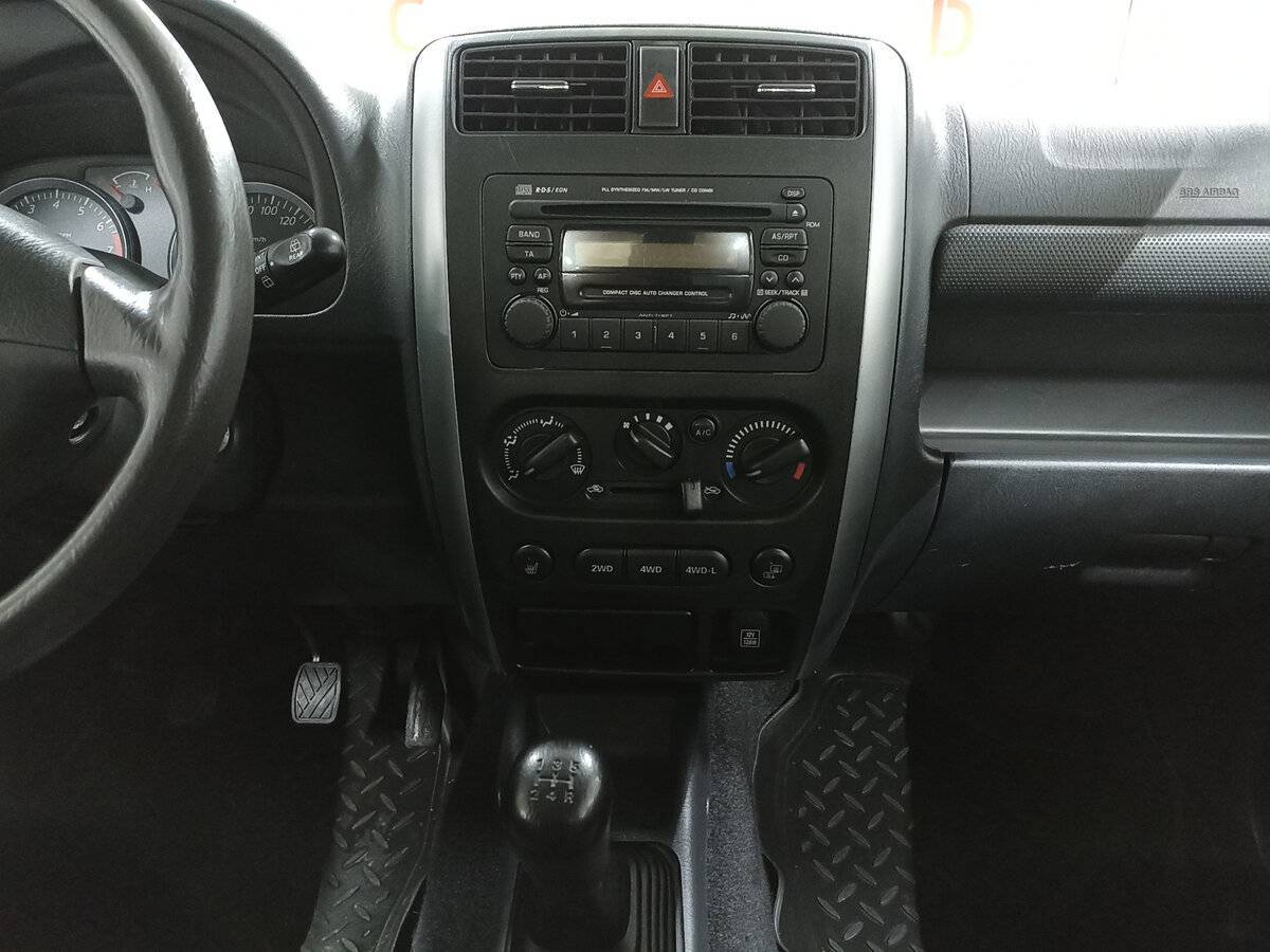 Suzuki Jimny с пробегом — 2013 год. Фото: #14