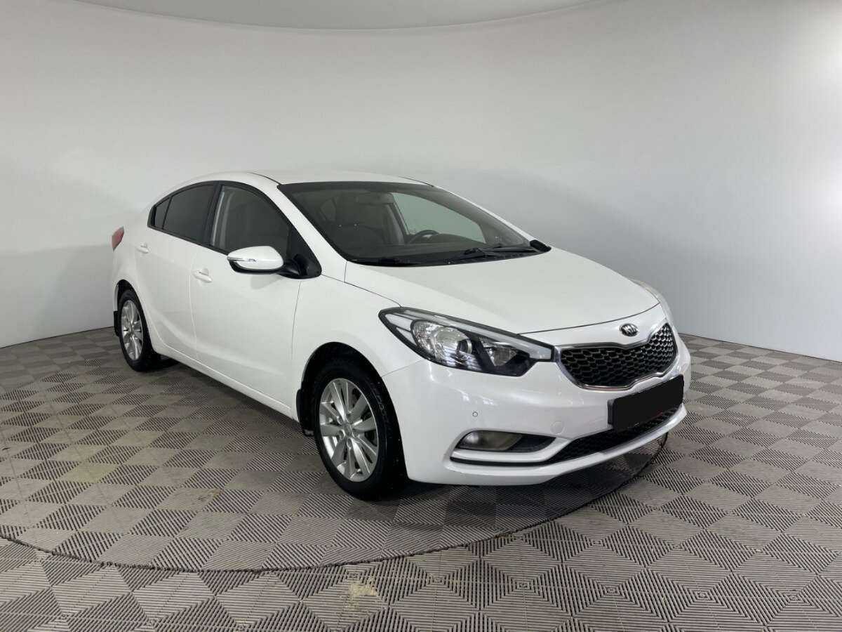 Kia Cerato с пробегом — 2014 год. Фото: #2