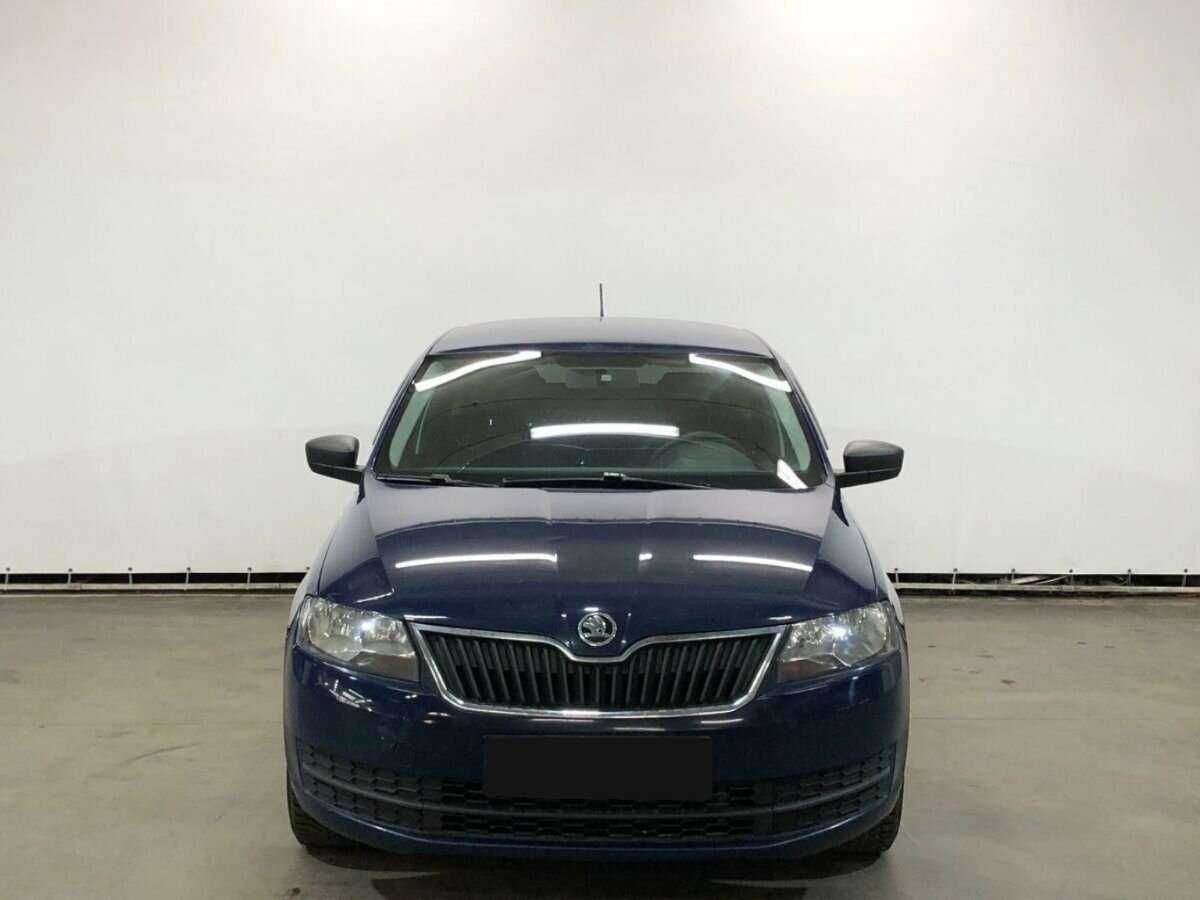 Skoda Rapid с пробегом — 2015 год. Фото: #1