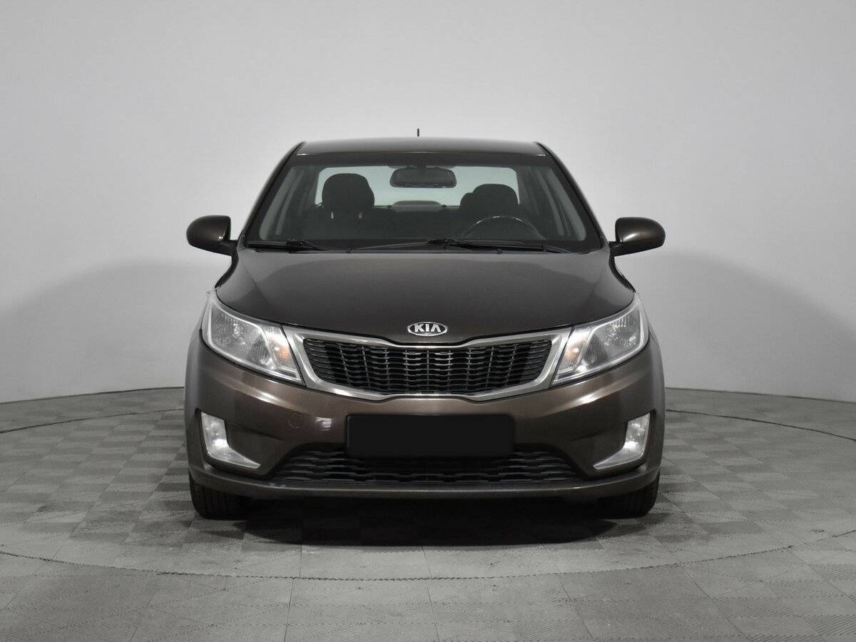 Kia Rio с пробегом — 2014 год. Фото: #1