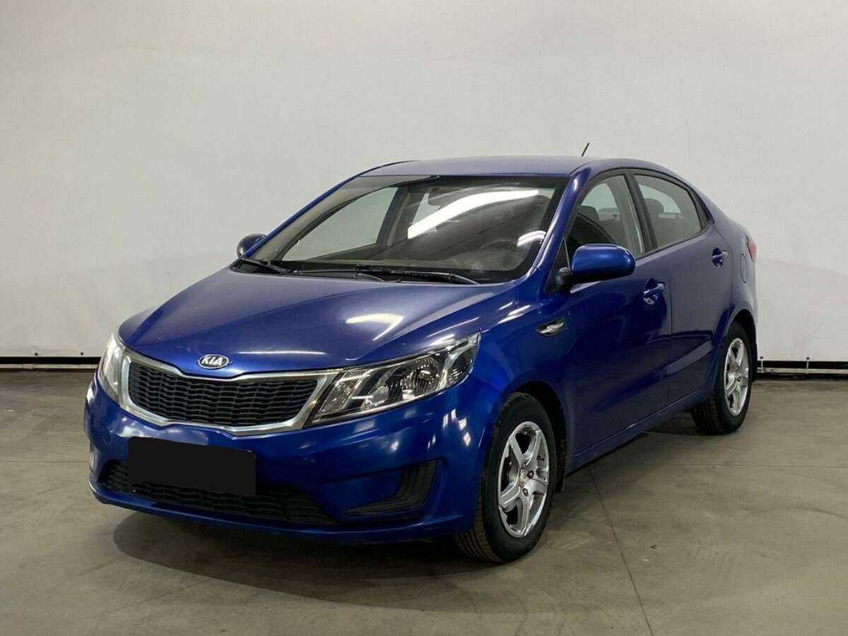 Kia Rio с пробегом — 2013 год. Фото: #0