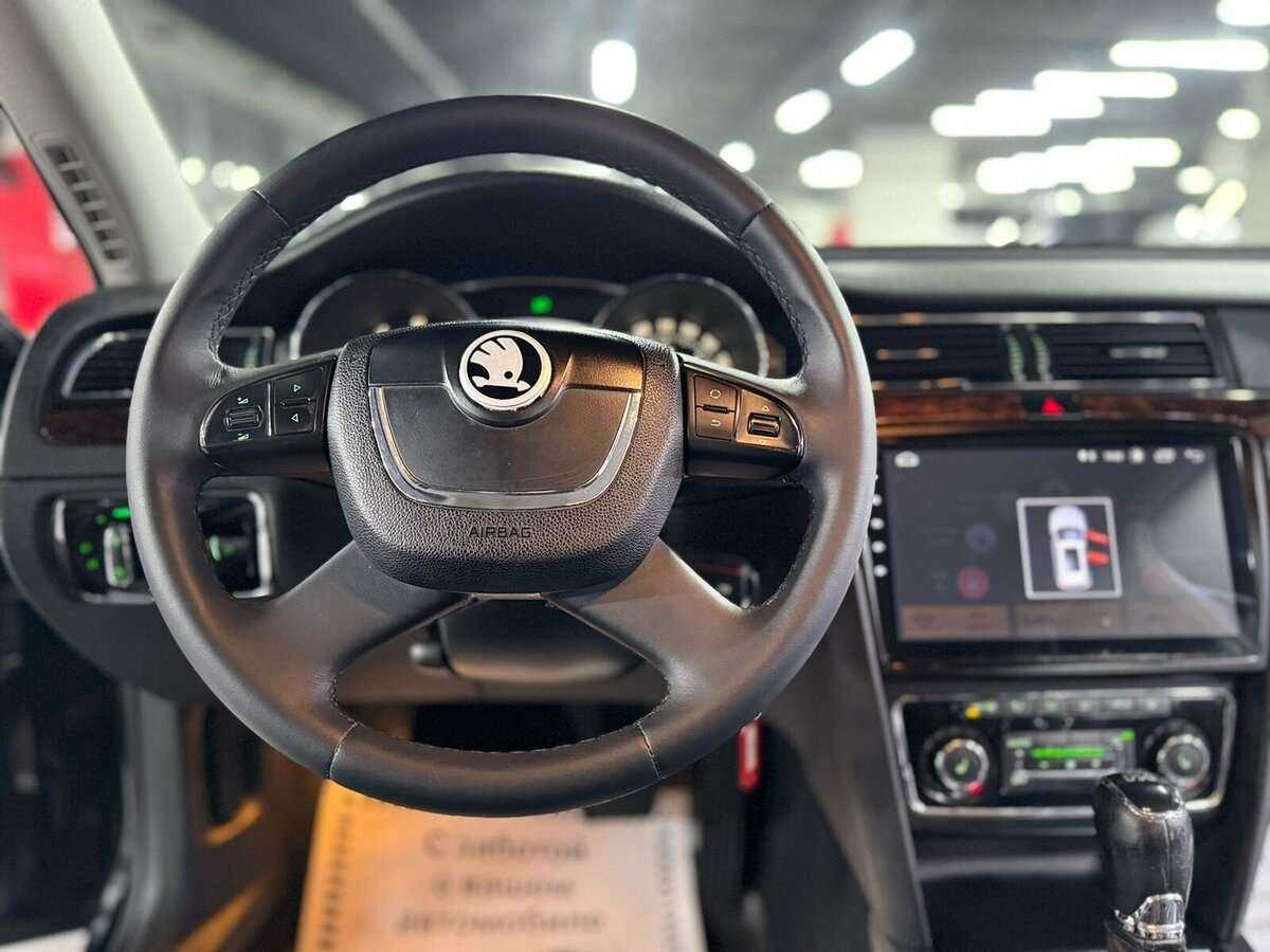 Skoda Superb с пробегом — 2013 год. Фото: #7