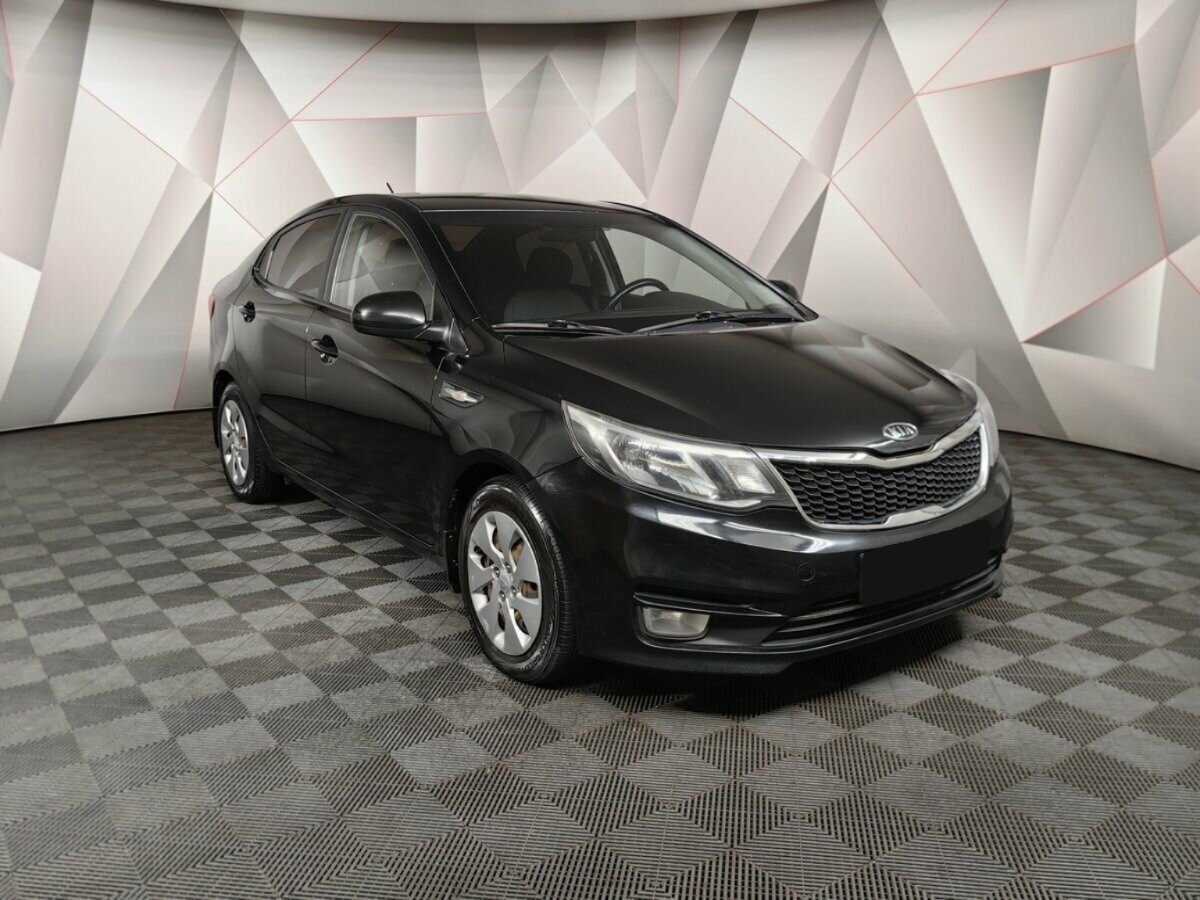 Kia Rio с пробегом — 2015 год. Фото: #2