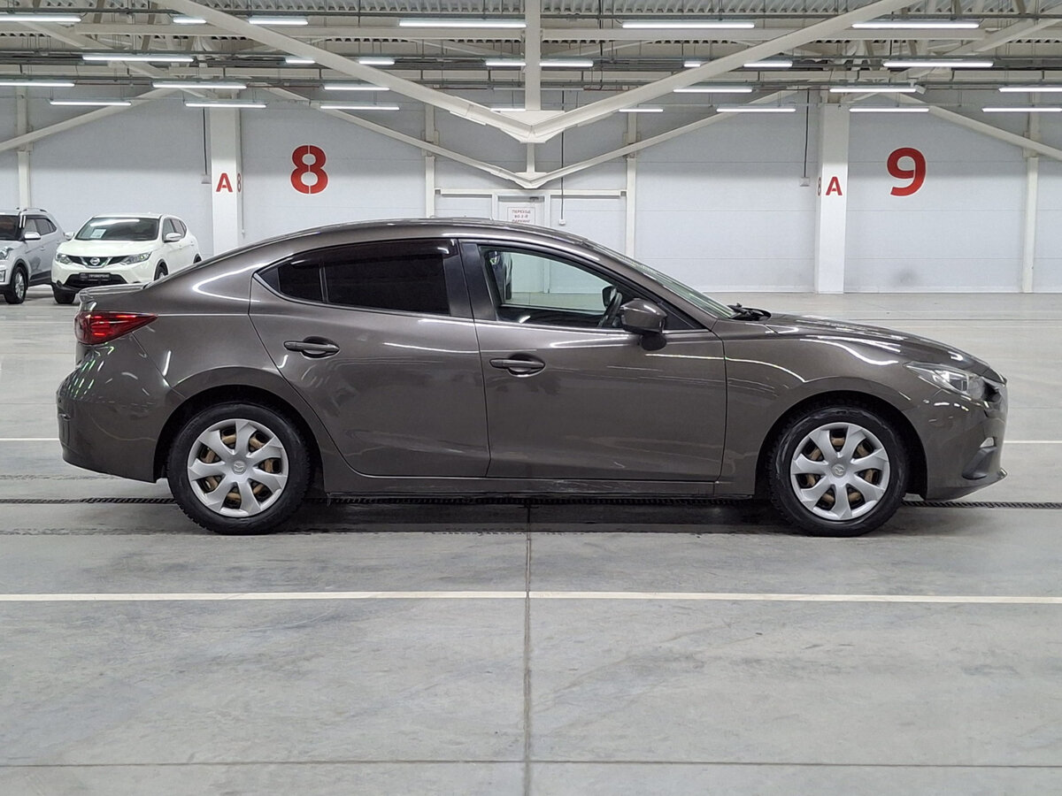 Mazda 3 с пробегом — 2014 год. Фото: #3