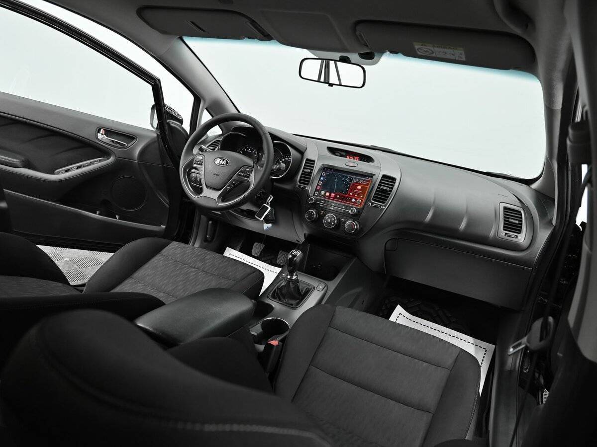 Kia Cerato с пробегом — 2015 год. Фото: #13