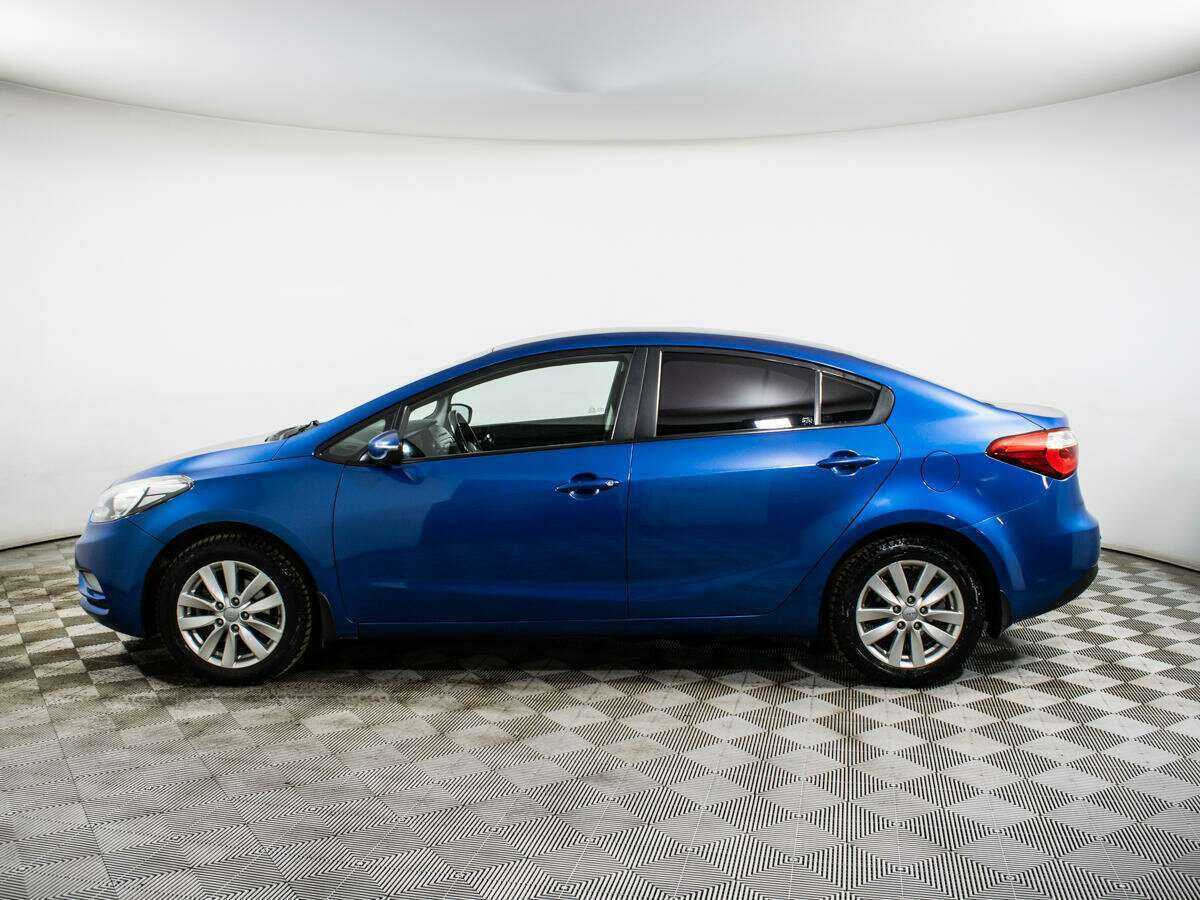 Kia Cerato с пробегом — 2014 год. Фото: #7