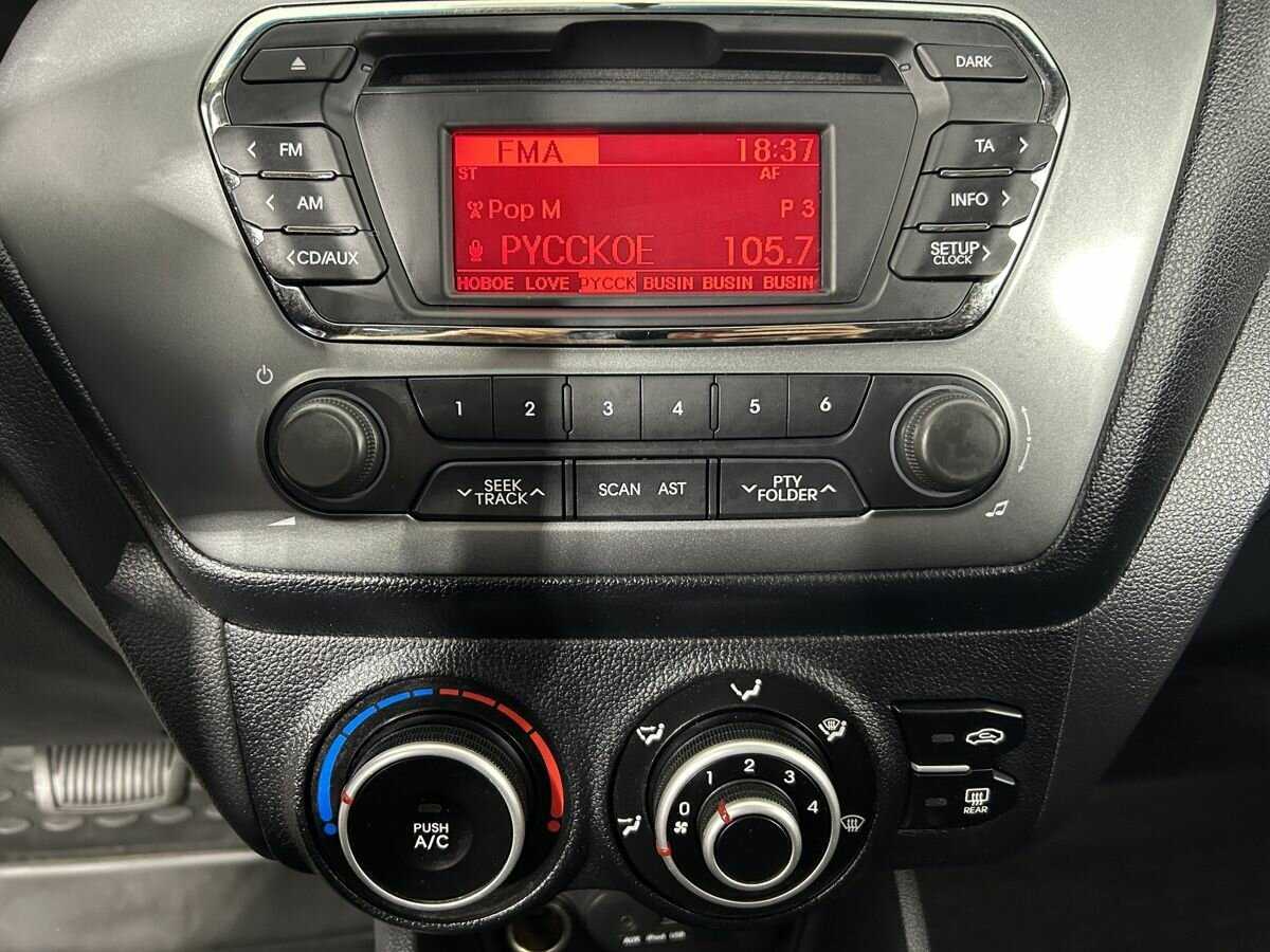 Kia Rio с пробегом — 2014 год. Фото: #10
