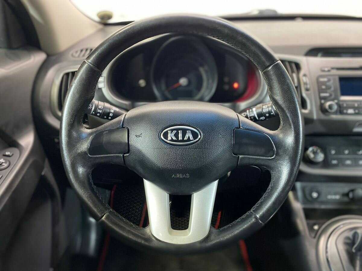 Kia Sportage с пробегом — 2012 год. Фото: #11