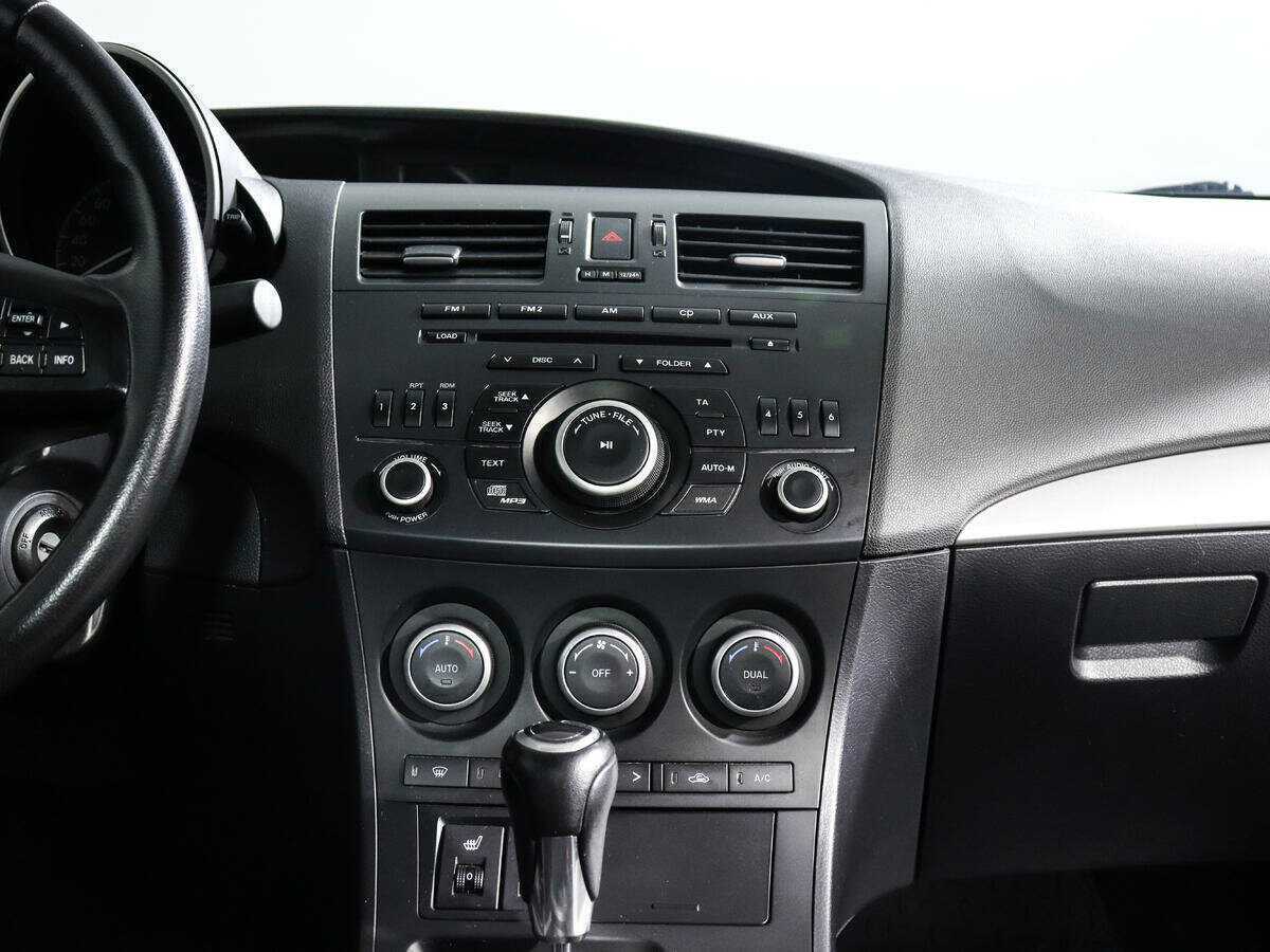 Mazda 3 с пробегом — 2013 год. Фото: #12