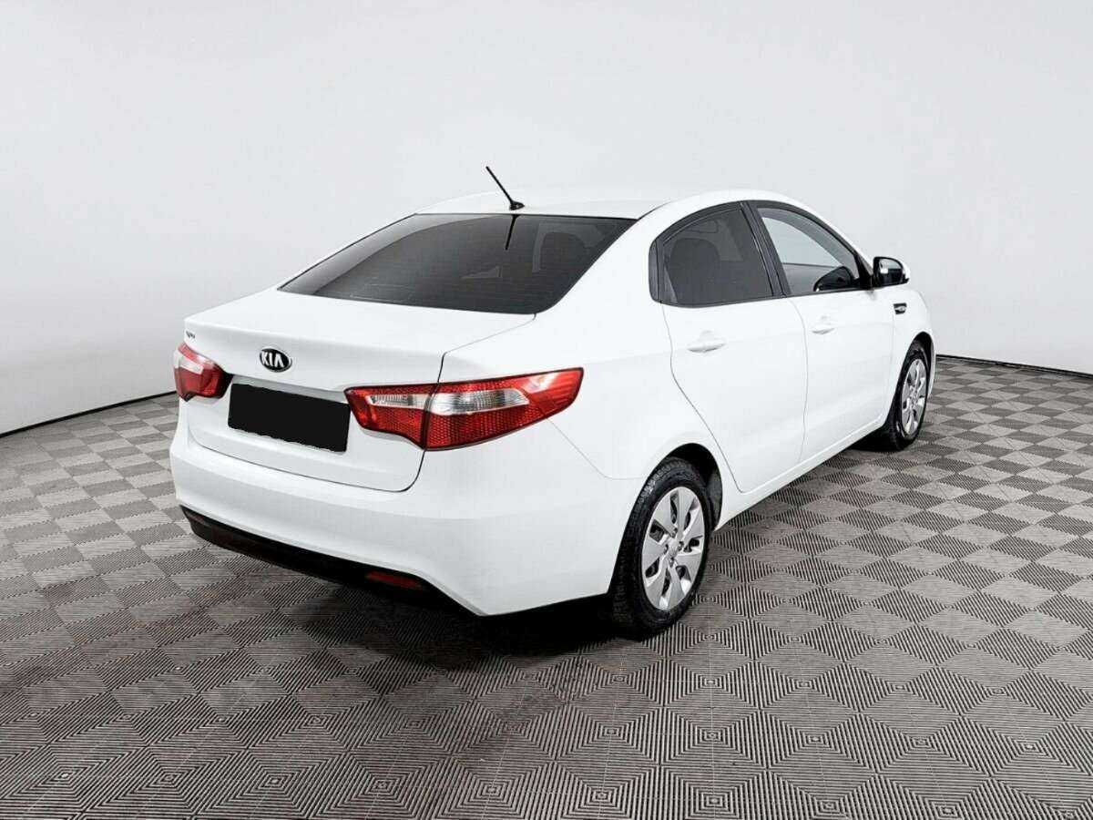 Kia Rio с пробегом — 2013 год. Фото: #4