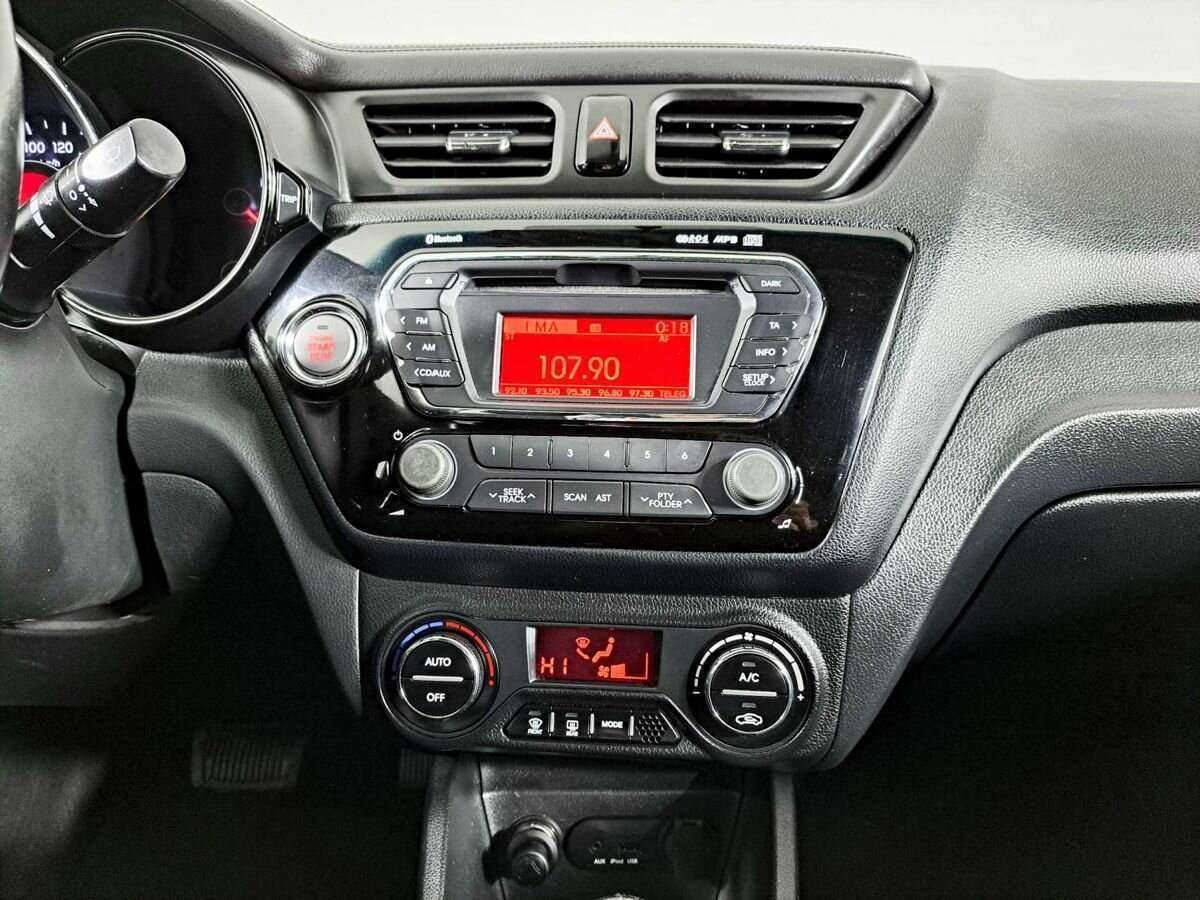 Kia Rio с пробегом — 2014 год. Фото: #11