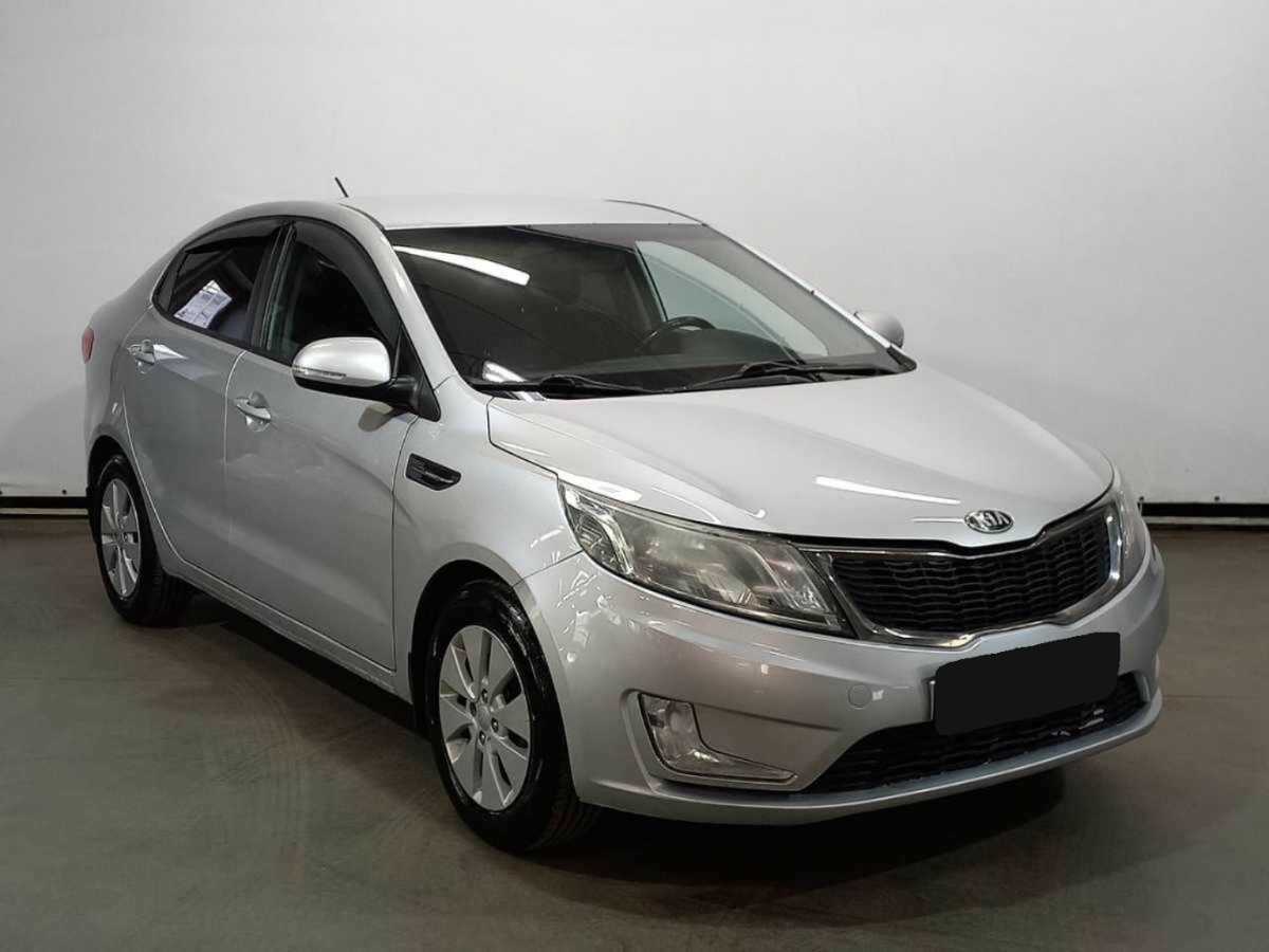 Kia Rio с пробегом — 2013 год. Фото: #2