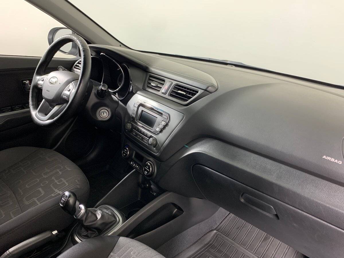 Kia Rio с пробегом — 2013 год. Фото: #12