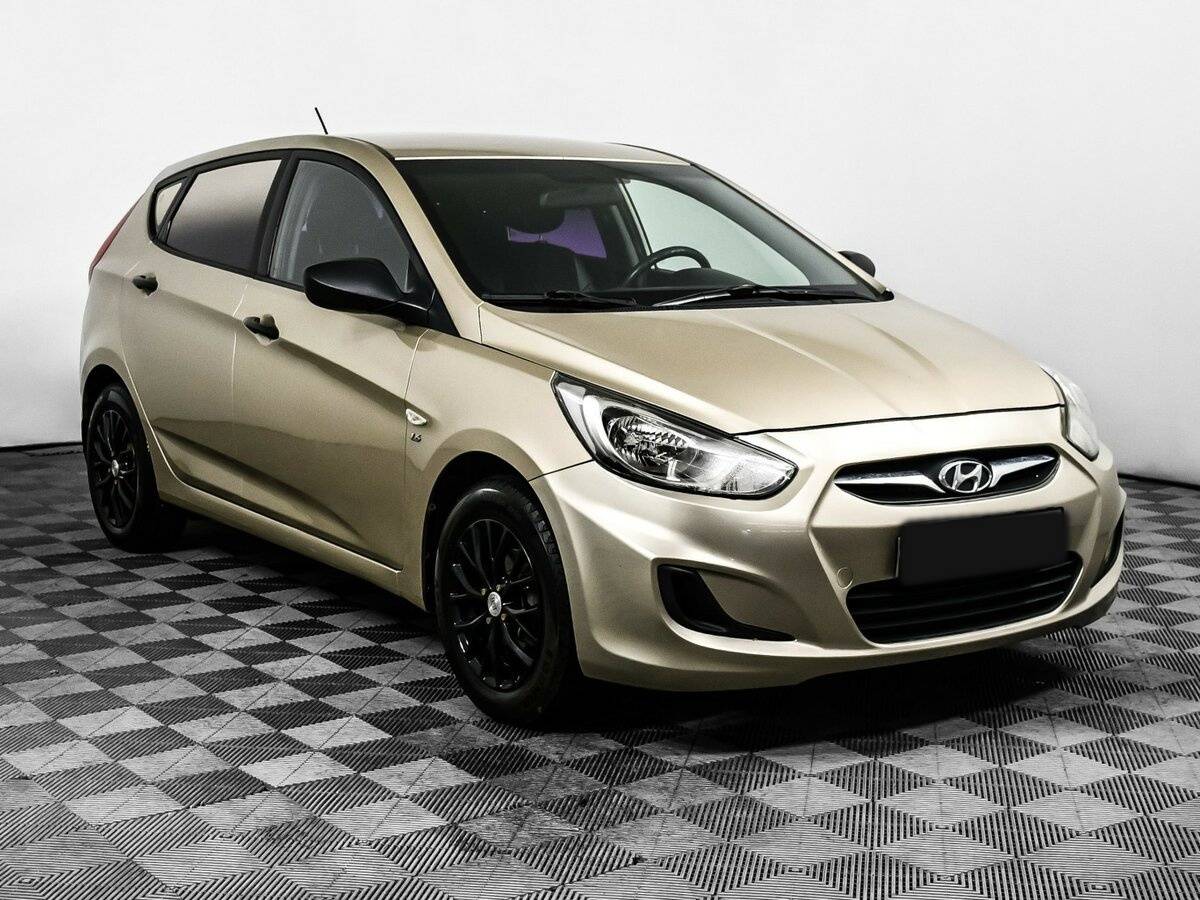 Hyundai Solaris с пробегом — 2012 год. Фото: #2