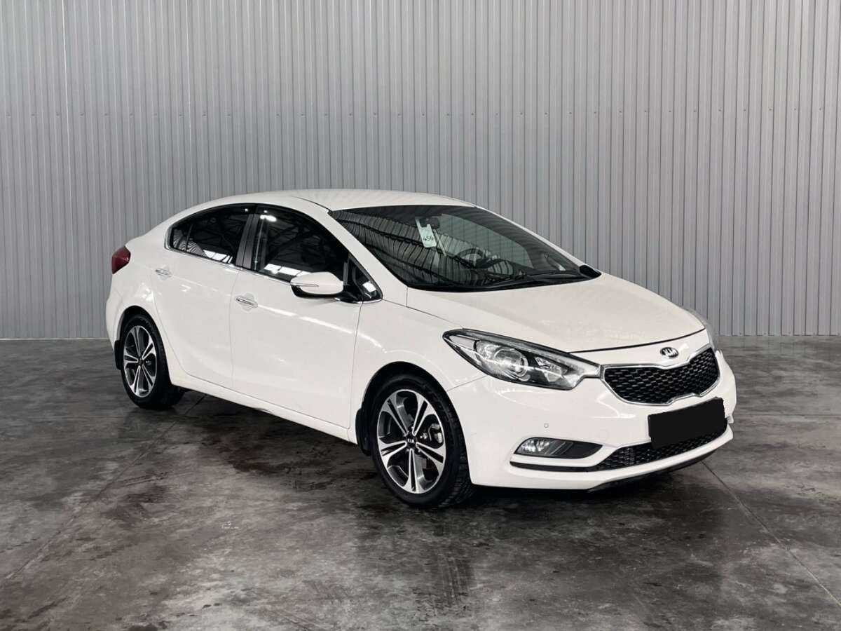 Kia Cerato с пробегом — 2014 год. Фото: #2