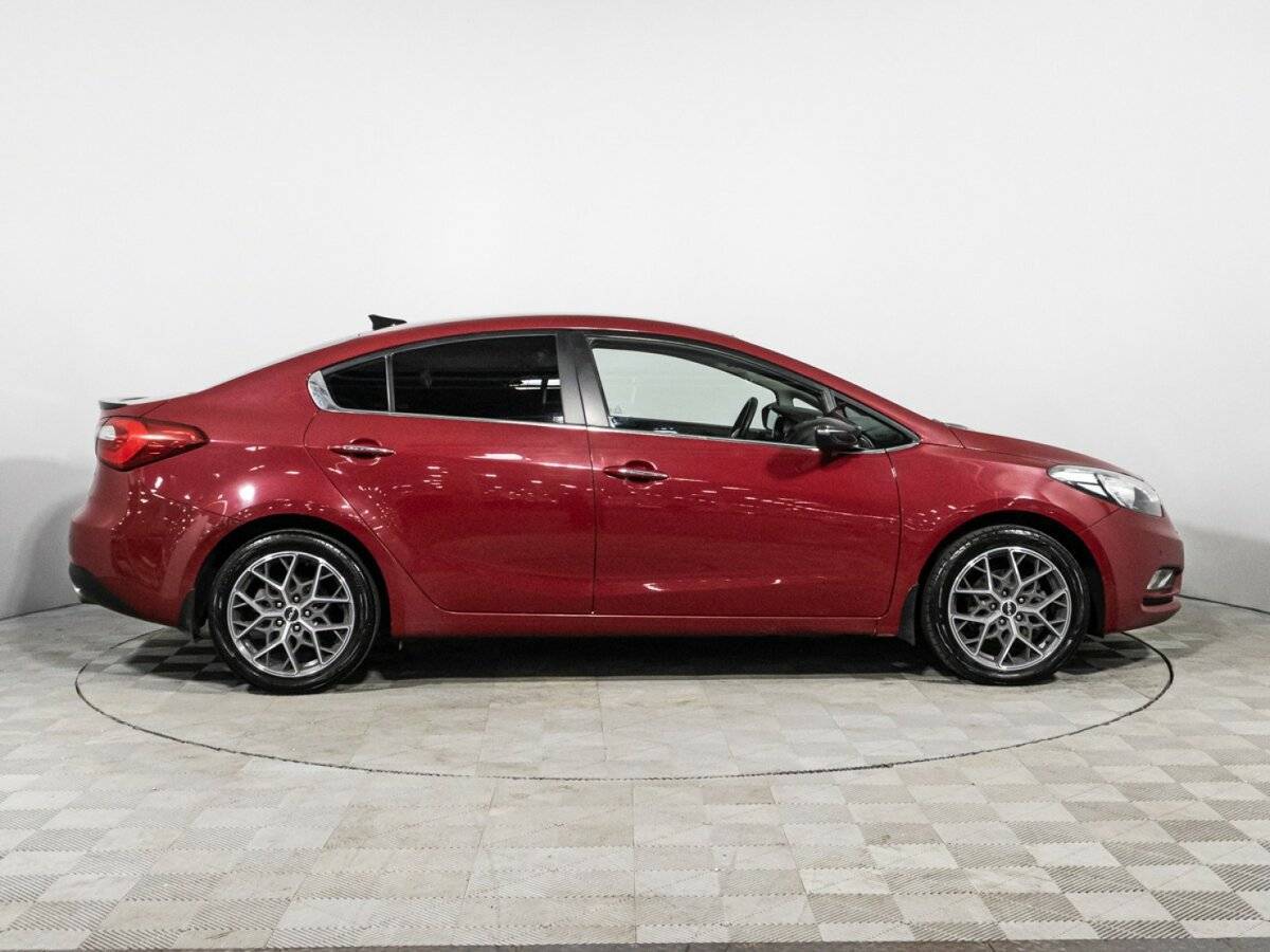 Kia Cerato с пробегом — 2014 год. Фото: #3