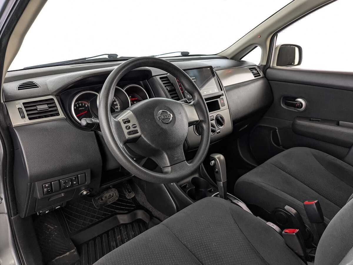 Nissan Tiida с пробегом — 2013 год. Фото: #14