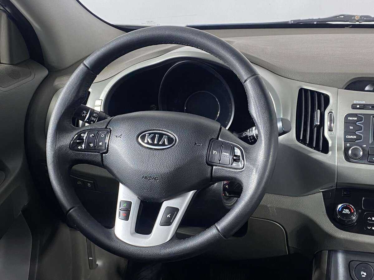 Kia Sportage с пробегом — 2012 год. Фото: #9
