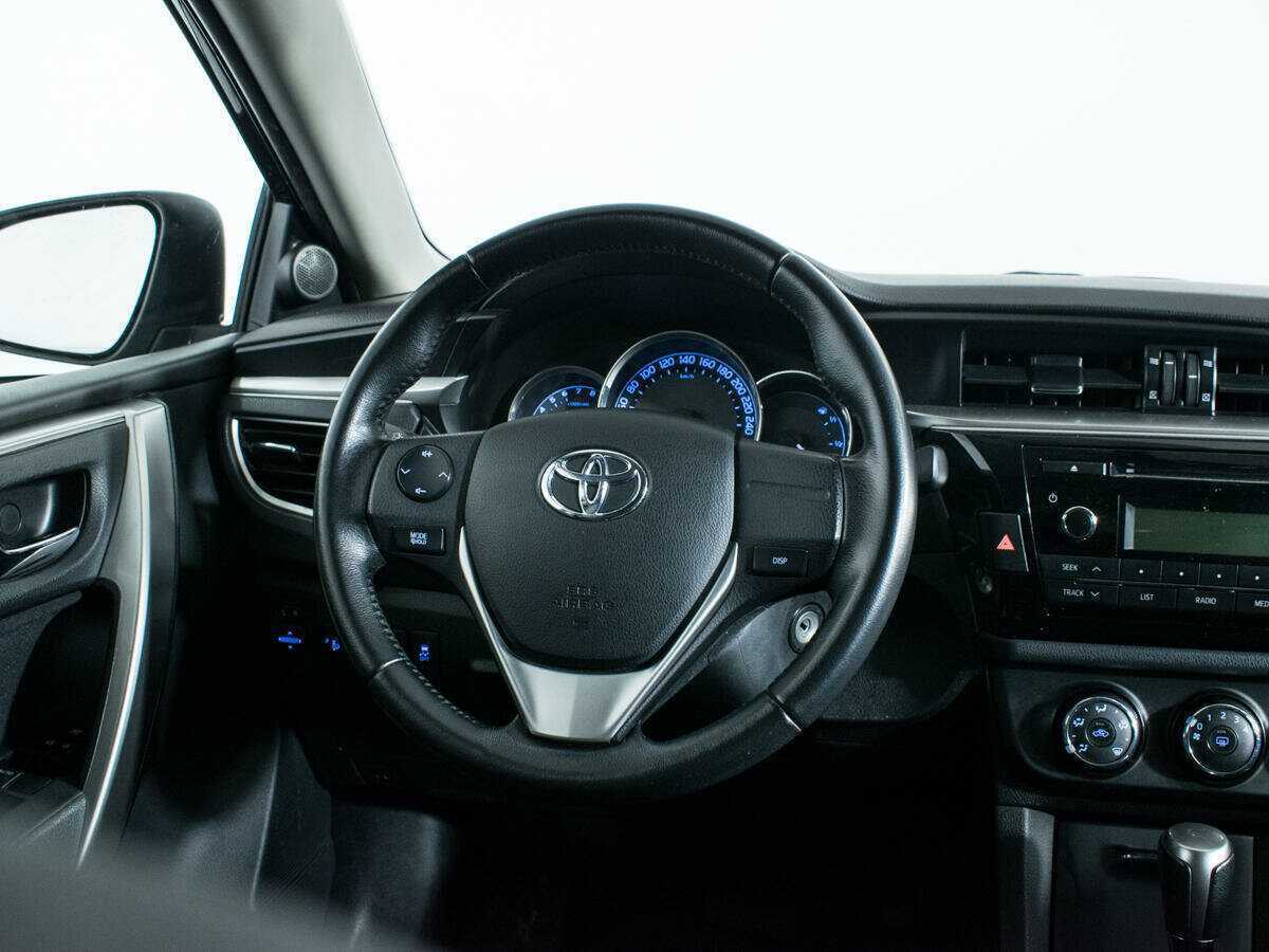 Toyota Corolla с пробегом — 2013 год. Фото: #13