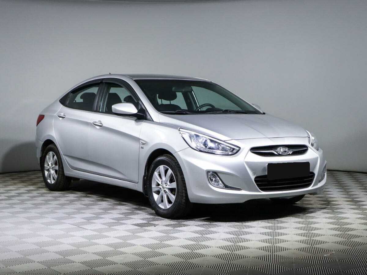 Hyundai Solaris с пробегом — 2014 год. Фото: #2
