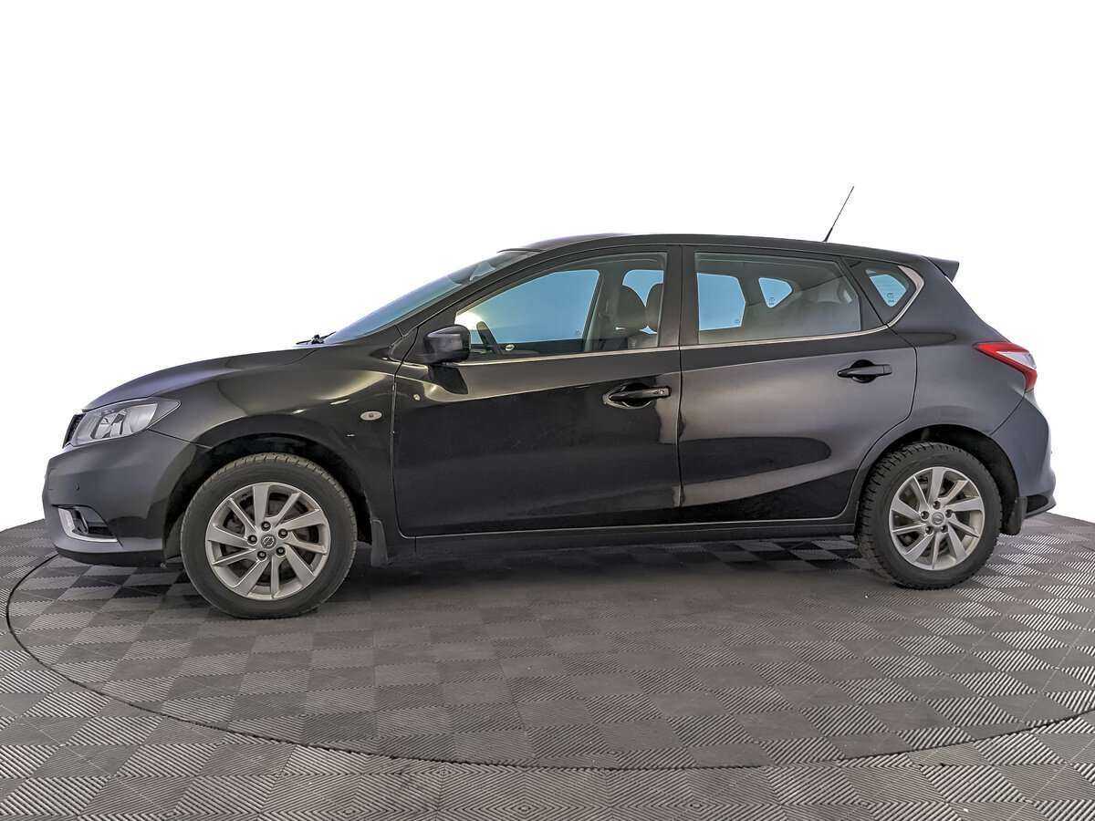 Nissan Tiida с пробегом — 2015 год. Фото: #7